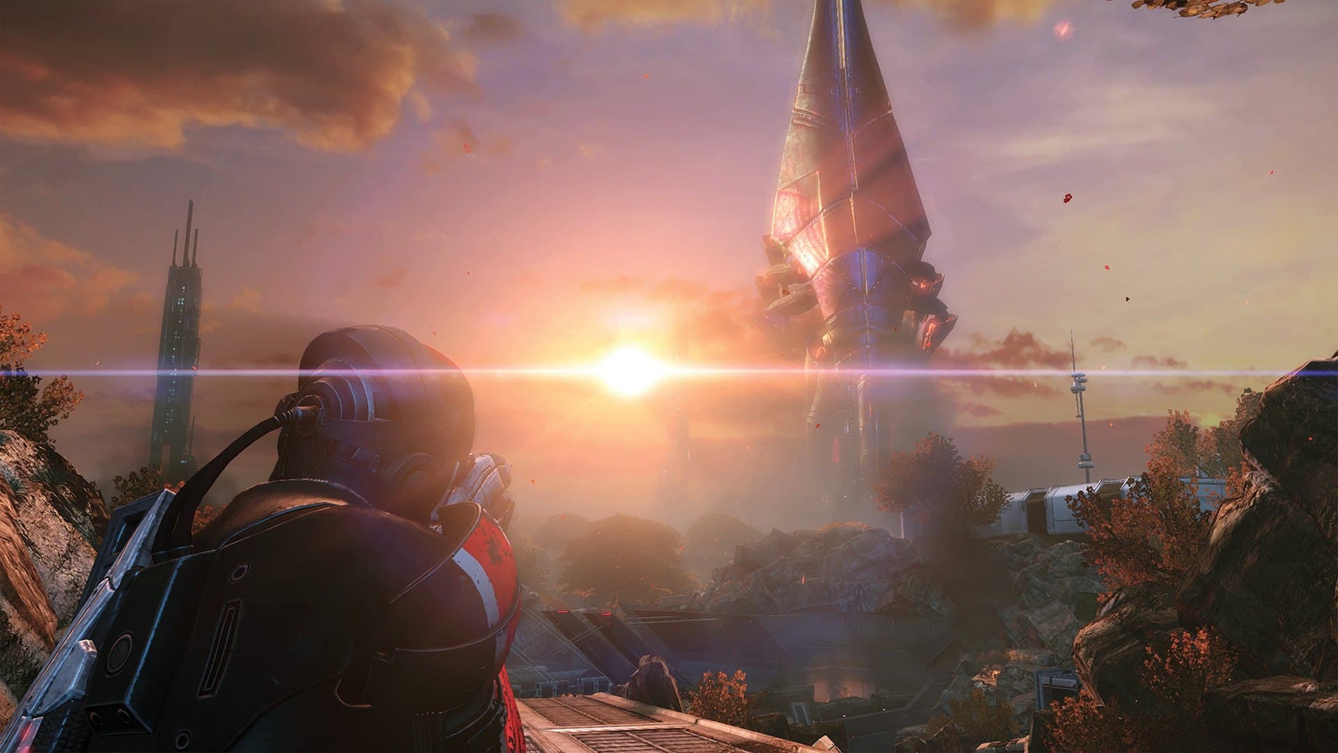 Comandante Shepard de costas observando a Cidadela ao pôr do sol em Mass Effect