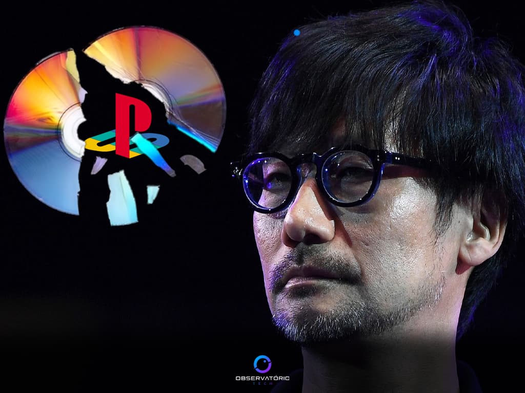 Hideo Kojima diante de uma representação de mídia física do PlayStation quebrada