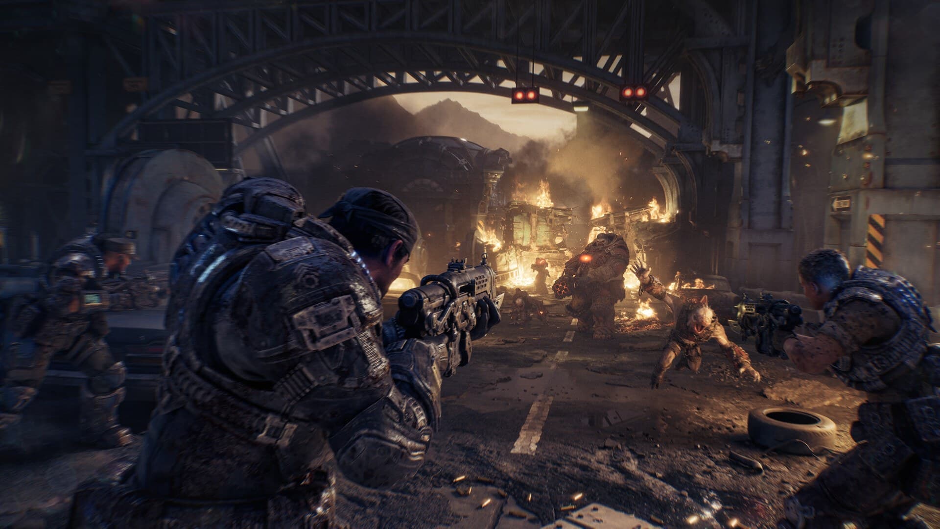Soldados da COG trocam tiros numa rua destruída em Gears of War: E-Day